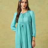 Model wearing blue moth and stripe block printed empire line dress – RA Studio