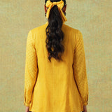 Back view of yellow block printed shirt with Chinese collar and hand-embroidered stripes and dots – RA Studio