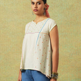 Creamy white flared top with hand embroidery, checks and thin stripes – RA Studio