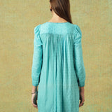 Back view of Model wearing blue moth and stripe block printed empire line dress – RA Studio
