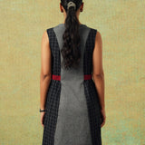 Back view of Sleeveless black and grey panel A-line dress with red belt detailing – RA Studio