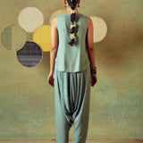 Back view of green striped Turkish pants with moth block print – RA Studio