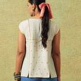 Back view of creamy white flared top with checks and thin stripes - RA Studio
