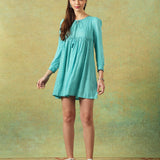 Model wearing blue moth and stripe block printed empire line dress – RA Studio