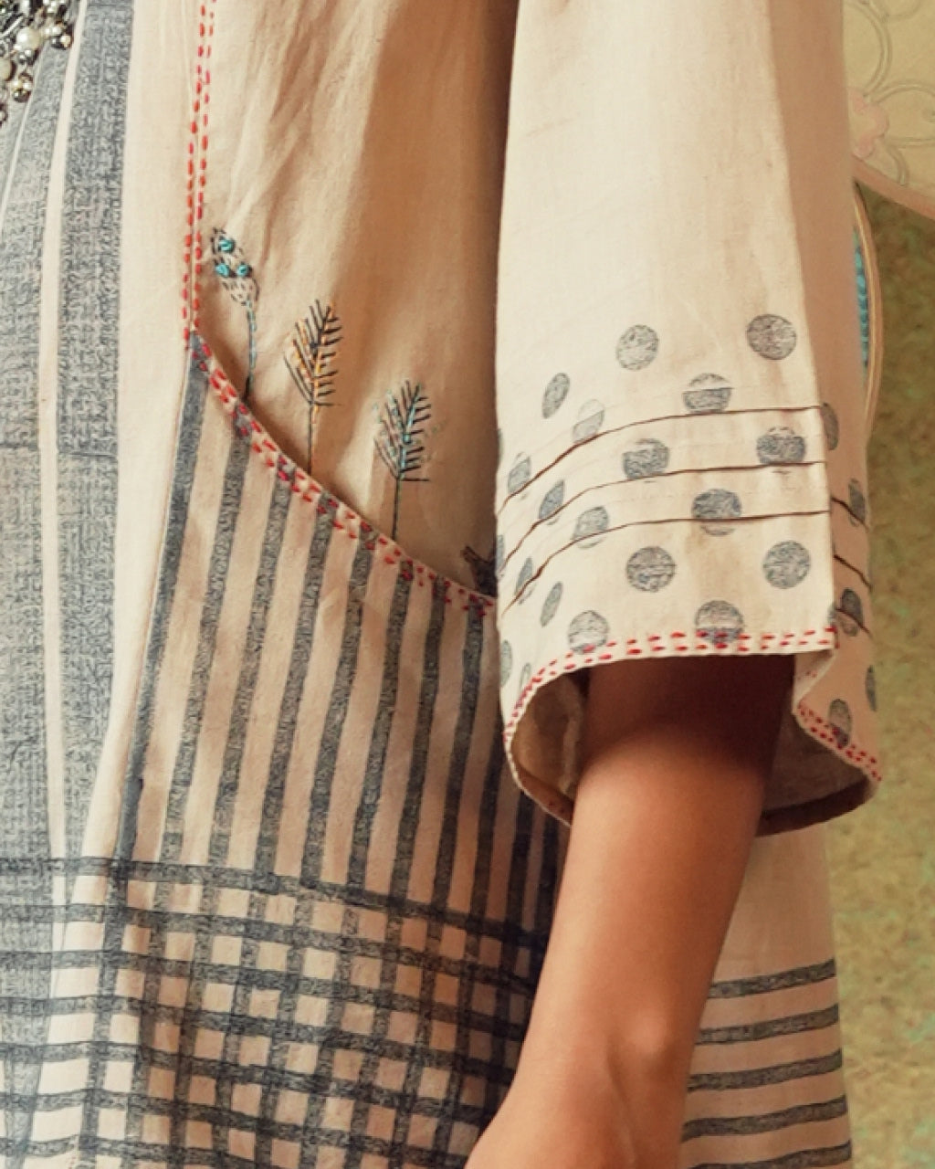 Close up of sleeve of Beige block printed tunic with princess line cut and embroidered pocket – RA Studio
