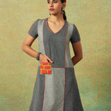 Patchwork dress in shades of grey with bold orange side pocket – RA Studio