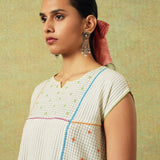 Creamy white flared top with hand embroidery, checks and thin stripes – RA Studio
