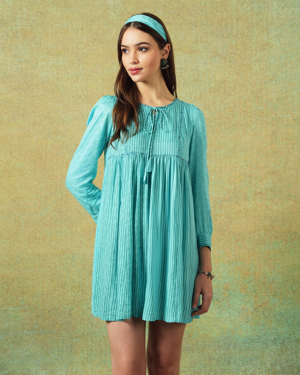 Model wearing blue moth and stripe block printed empire line dress – RA Studio
