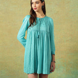 Model wearing blue moth and stripe block printed empire line dress – RA Studio