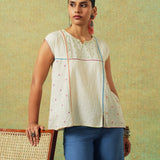 Creamy white flared top with hand embroidery, checks and thin stripes – RA Studio