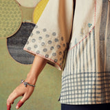 Close up of sleeve of Beige block printed tunic with princess line cut and embroidered pocket – RA Studio