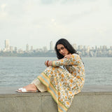 White Cotton Princess-Line Flared Dress with Yellow Floral Block Print and Stripe Hem Border