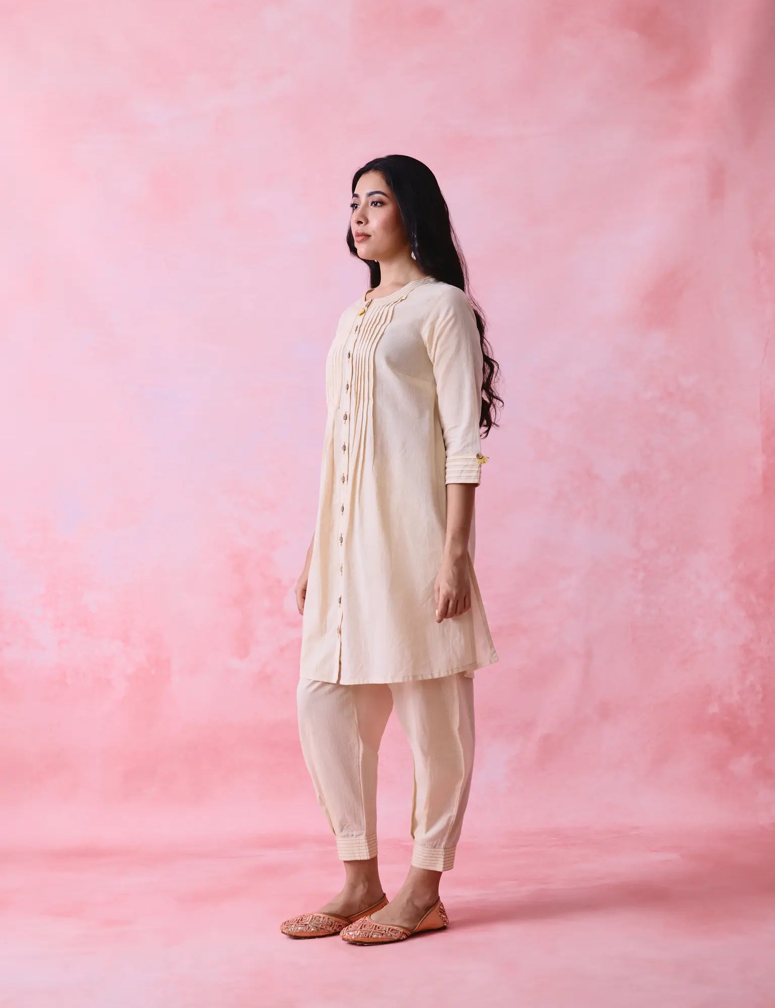 Woman wearing beige kurta set