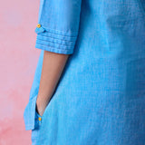 Blue cotton Mangalgiri kurta and pant co-ord with multicolour buttons, hand embroidery and cotton-bell details.
