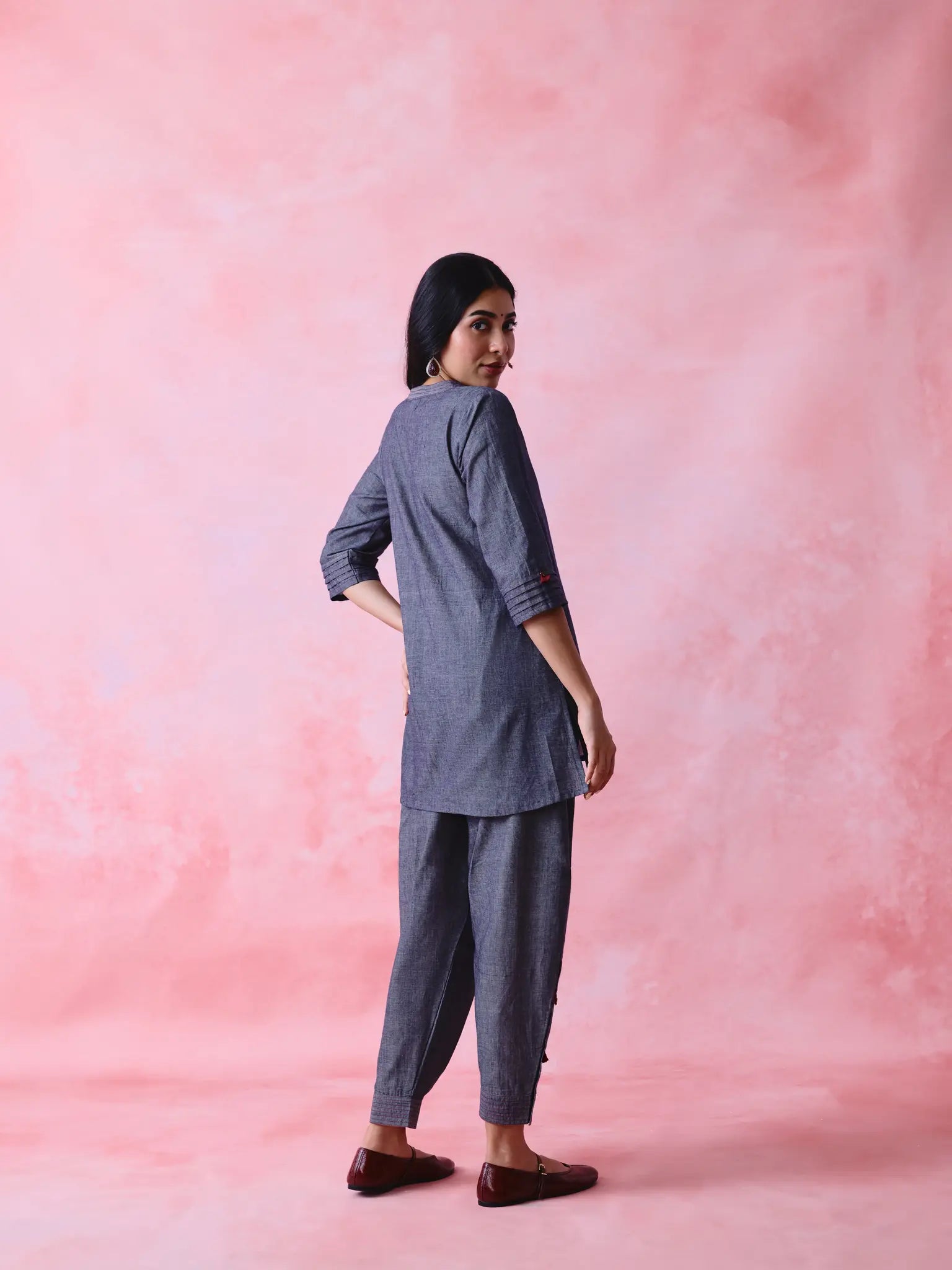 Grey cotton Mangalgiri kurta and pant co-ord with hand embroidery, multicolour buttons and cotton-bell details.