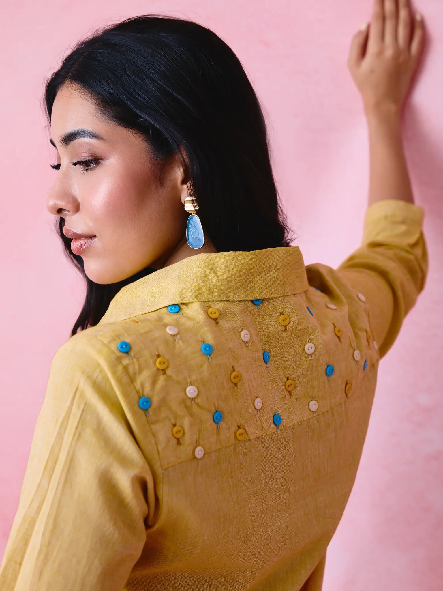 Yellow cotton Mangalgiri yoke shirt with multicolour button detailing.