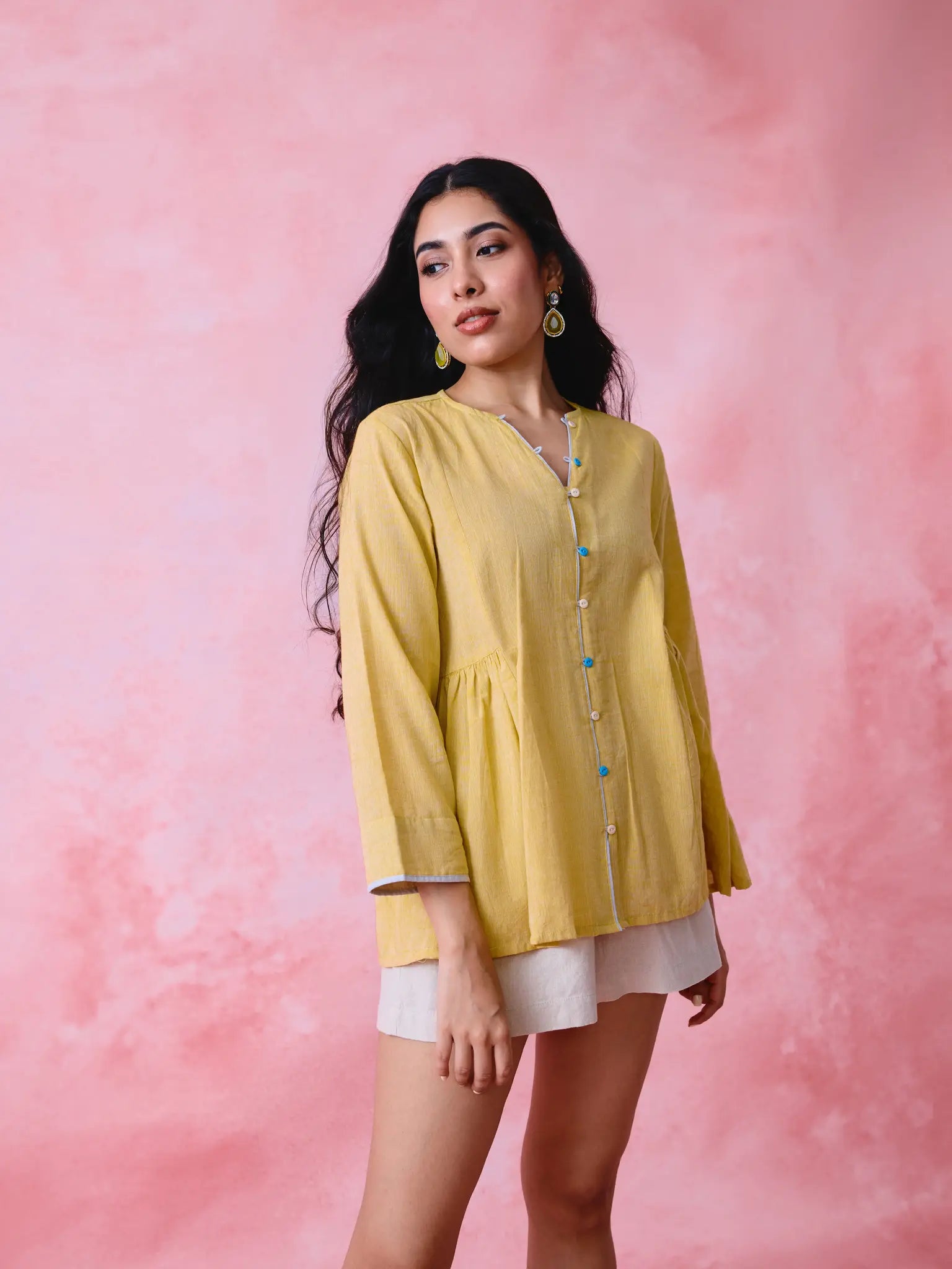 Yellow cotton Mangalgiri tunic with side gathers, front loop buttons and contrasting grey trim.