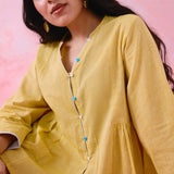Yellow cotton Mangalgiri tunic with side gathers, front loop buttons and contrasting grey trim.