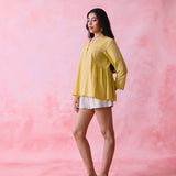 Yellow cotton Mangalgiri tunic with side gathers, front loop buttons and contrasting grey trim.