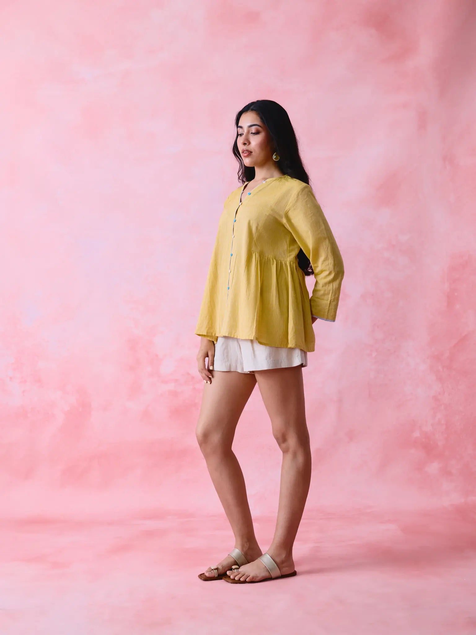 Yellow cotton Mangalgiri tunic with side gathers, front loop buttons and contrasting grey trim.