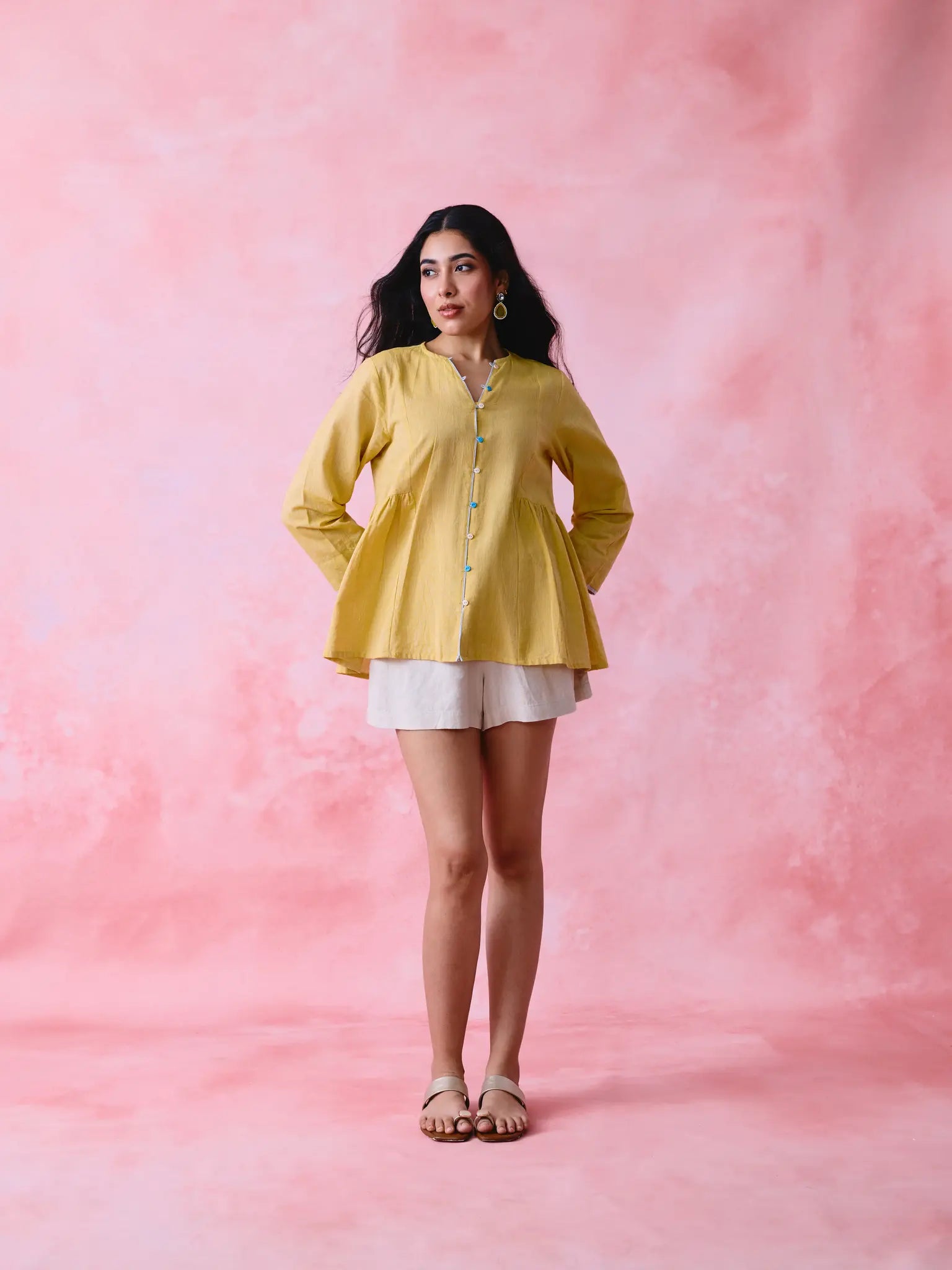 Yellow cotton Mangalgiri tunic with side gathers, front loop buttons and contrasting grey trim.