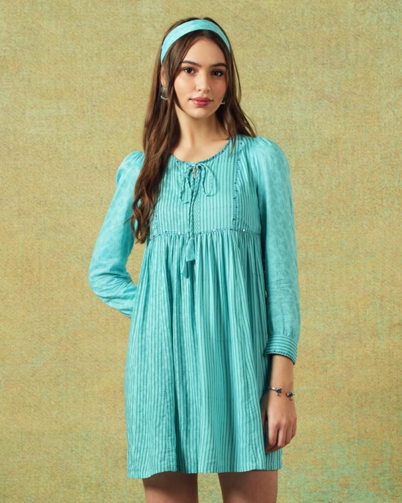 Model wearing blue moth and stripe block printed empire line dress – RA Studio