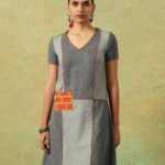 Patchwork dress in shades of grey with bold orange side pocket – RA Studio