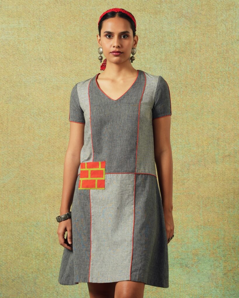 Patchwork dress in shades of grey with bold orange side pocket – RA Studio