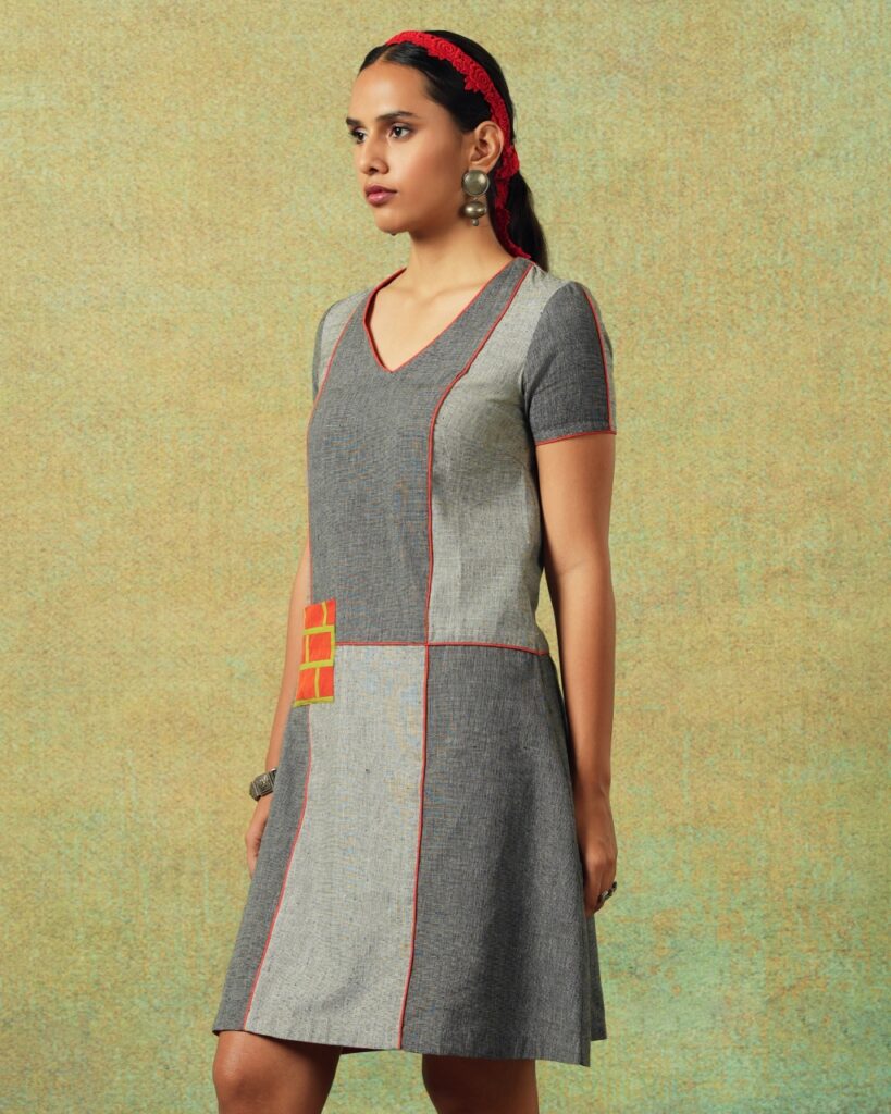 Patchwork dress in shades of grey with bold orange side pocket – RA Studio