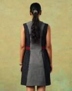 Back view of Sleeveless black and grey panel A-line dress with red belt detailing – RA Studio