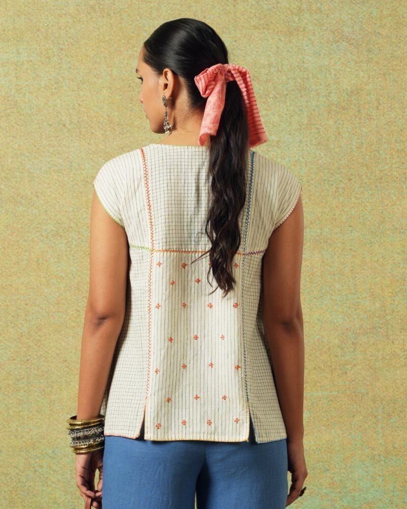 Back view of creamy white flared top with checks and thin stripes - RA Studio