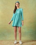 Model wearing blue moth and stripe block printed empire line dress – RA Studio
