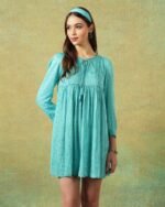 Model wearing blue moth and stripe block printed empire line dress – RA Studio
