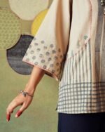 Close up of sleeve of Beige block printed tunic with princess line cut and embroidered pocket – RA Studio